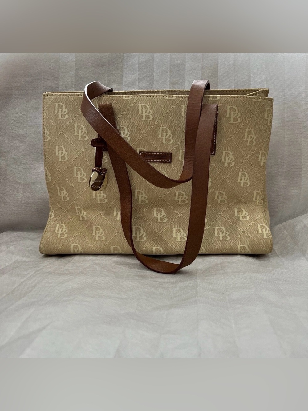 Dooney & Bourke Beige Logo Canvas Tote with Brown Leather Straps